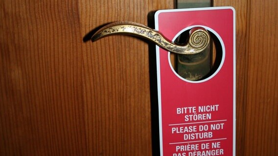 Ein "Bitte nicht stören" Schild an einer Tür. © photocase Foto: Dot.ti